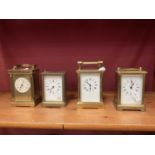 Four brass carriage clocks