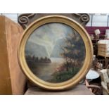 Oil on board study of a lake, tondo, in gilt frame