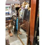 Large mirror in shaped gilt frame, 103cm x 184cm