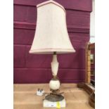 Turned stone table lamp and shade