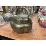 Japanese silvered metal cricket cage with pierced cover and swing handle, character mark to base.