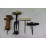 Two pillar bone and steel corkscrew and three other corkscrews