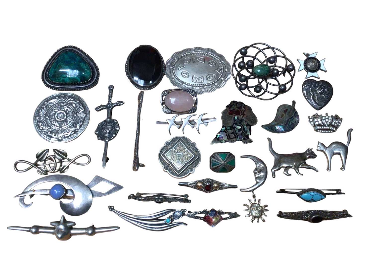 Collection of silver and white metal brooches