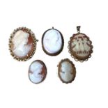 Five gold mounted carved shell cameo brooches/pendants