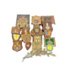 Collection of old military wall plaques including Regimental and memorial