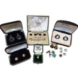 Set of four 9ct gold and black onyx dress studs with 18ct white gold borders in fitted leather box a