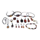 Group of silver mounted amber jewellery