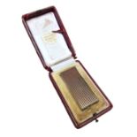 9ct gold lighter by A D Bach (Birmingham 1963), in a Cartier leather box