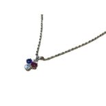 Victorian diamond ruby and blue sapphire pendant in the form of a spade, on a modern 9ct gold chain