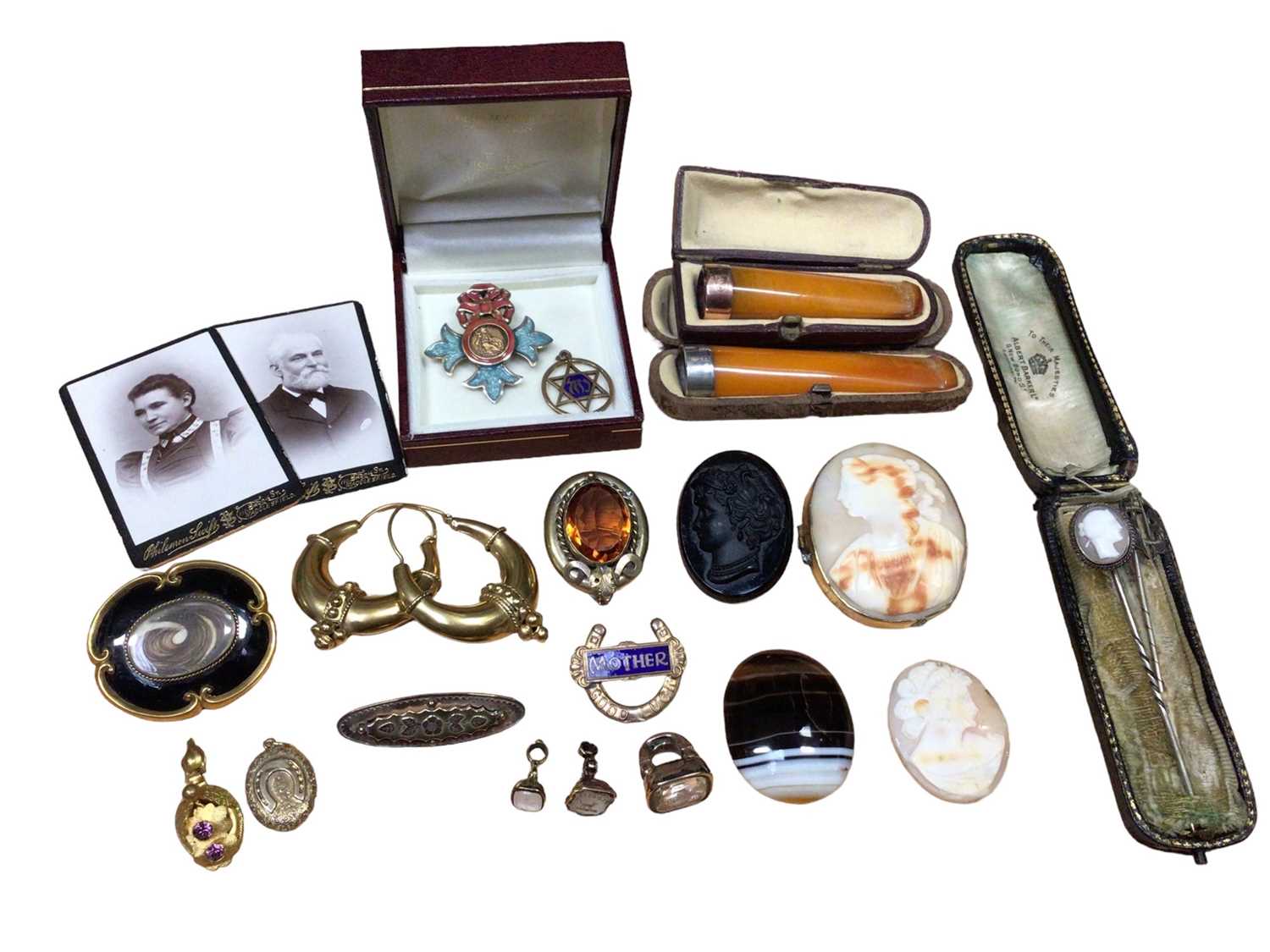 Group of antique and later jewellery and bijouterie including two amber cheroots, one with gold moun