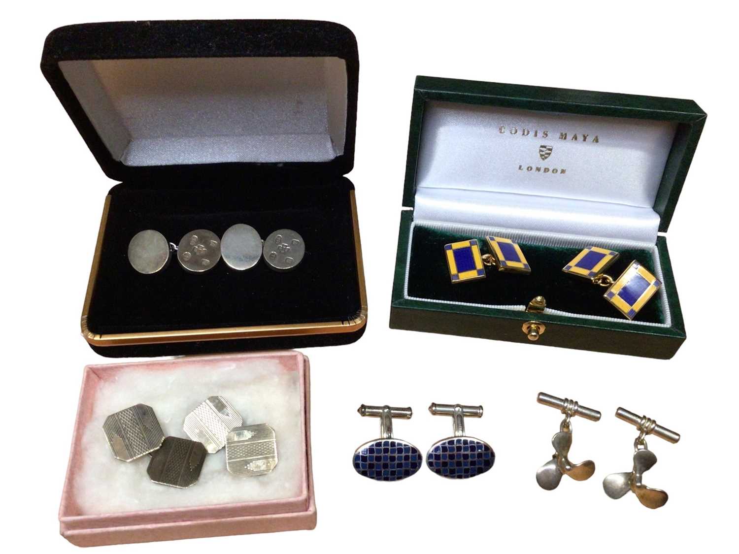 Four pairs of silver cufflinks and one other enamelled pair