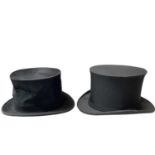 Two top hats in boxes, one is collapsible by Dunn & Co