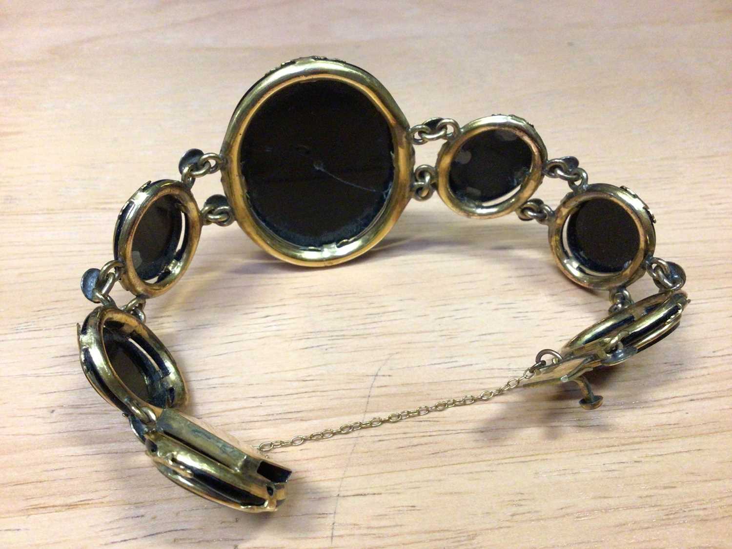 Victorian black glass cameo bracelet in yellow metal setting together with a black onyx and silver b - Image 4 of 5