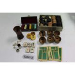 Box containing mah jong counters, other counters and dice, draughts, etc