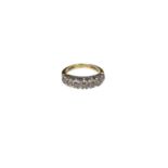 Diamond seven stone half hoop eternity ring in 18ct yellow gold setting