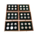World - Spink W.W.F. silver Commemorative coin collection housed in wood cabinet x 42, loose x 5 (To