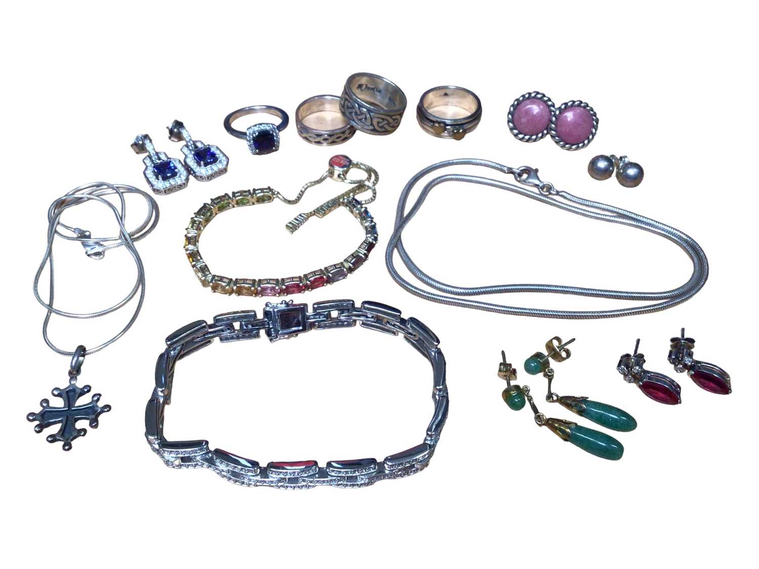 Group of silver rings, two silver chains, two gem set bracelets and various earrings