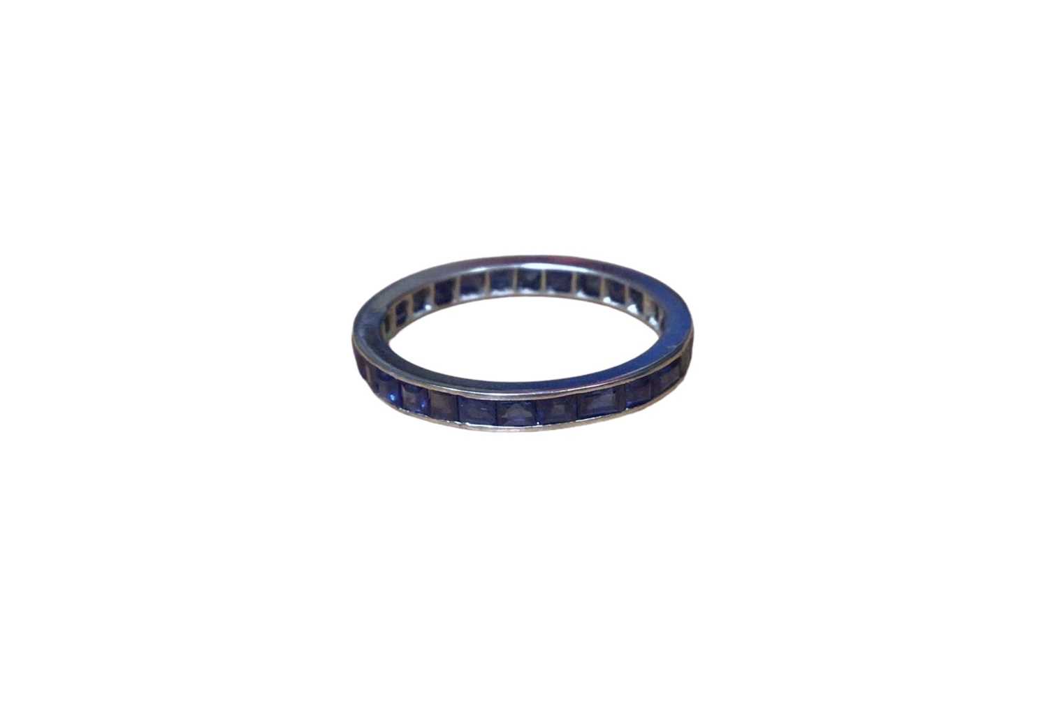 Platinum and blue sapphire eternity ring and a gold (750) enamel and paste set novelty pin in the fo - Image 2 of 4