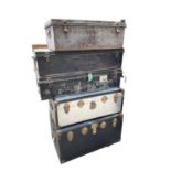 Three early 20th century military tin trunks, together with two ther later trunks (5)