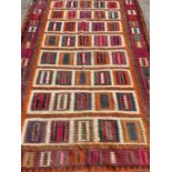 Large Kelim rug, with some moth damage, approximately 179 x 300cm, together with three further rugs.