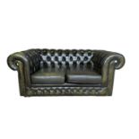 Green leather two-seater chesterfield settee
