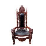 Highly ornate carved hardwood throne chair, 93w x 178h