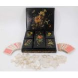 19th century papier mâché games box containing five boxes with playing cards and mother of pearl gam
