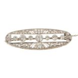 Edwardian Belle Époque diamond brooch, the oval openwork plaque with old cut diamonds in millegrain