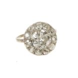 Antique diamond cluster ring with a central old cut diamond