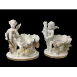 Two similar late 19th century Moore Bros. porcelain sweetmeat baskets decorated with cherubs and gil