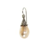 A single pearl and diamond earring with a pear shape pearl (not tested for natural origin)