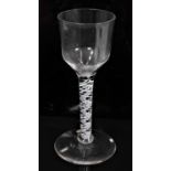 A Georgian double-series opaque twist wine glass, circa 1760, with ogee bowl, the stem consisting of