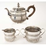 Early 20th century Britannia Standard silver Queen Anne revival three piece tea set