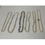 Six cultured pearl necklaces, mostly with gold clasps
