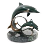 Scott Hanson (contemporary American) patinated bronze - Dolphins, signed, raised on revolving marble