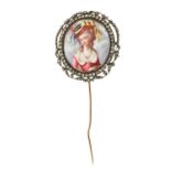 18th century enamel portrait miniature depicting a lady holding a bird, the oval enamel panel within