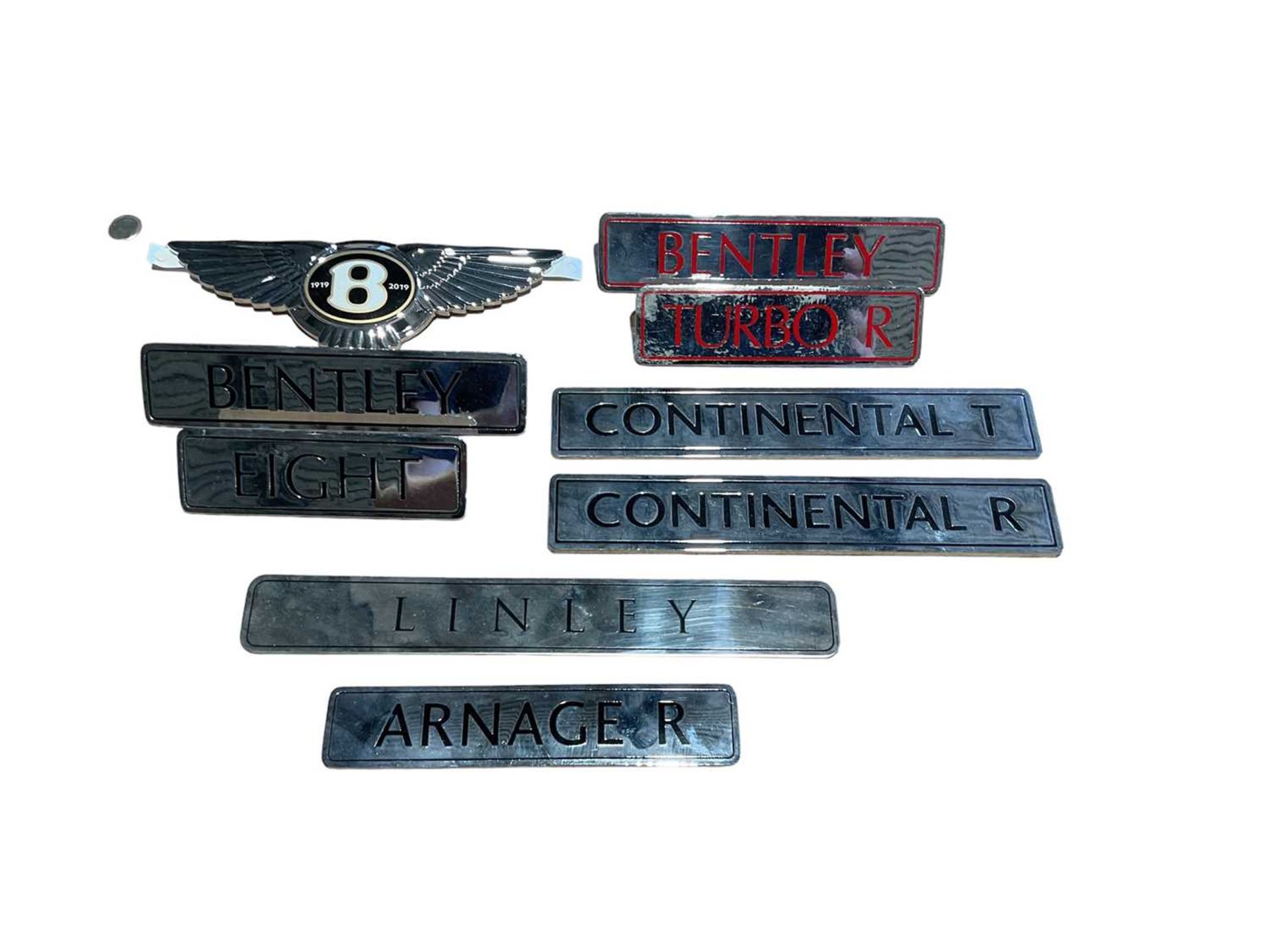 Collection of Bentley enamelled model name plates and boot badges (9)