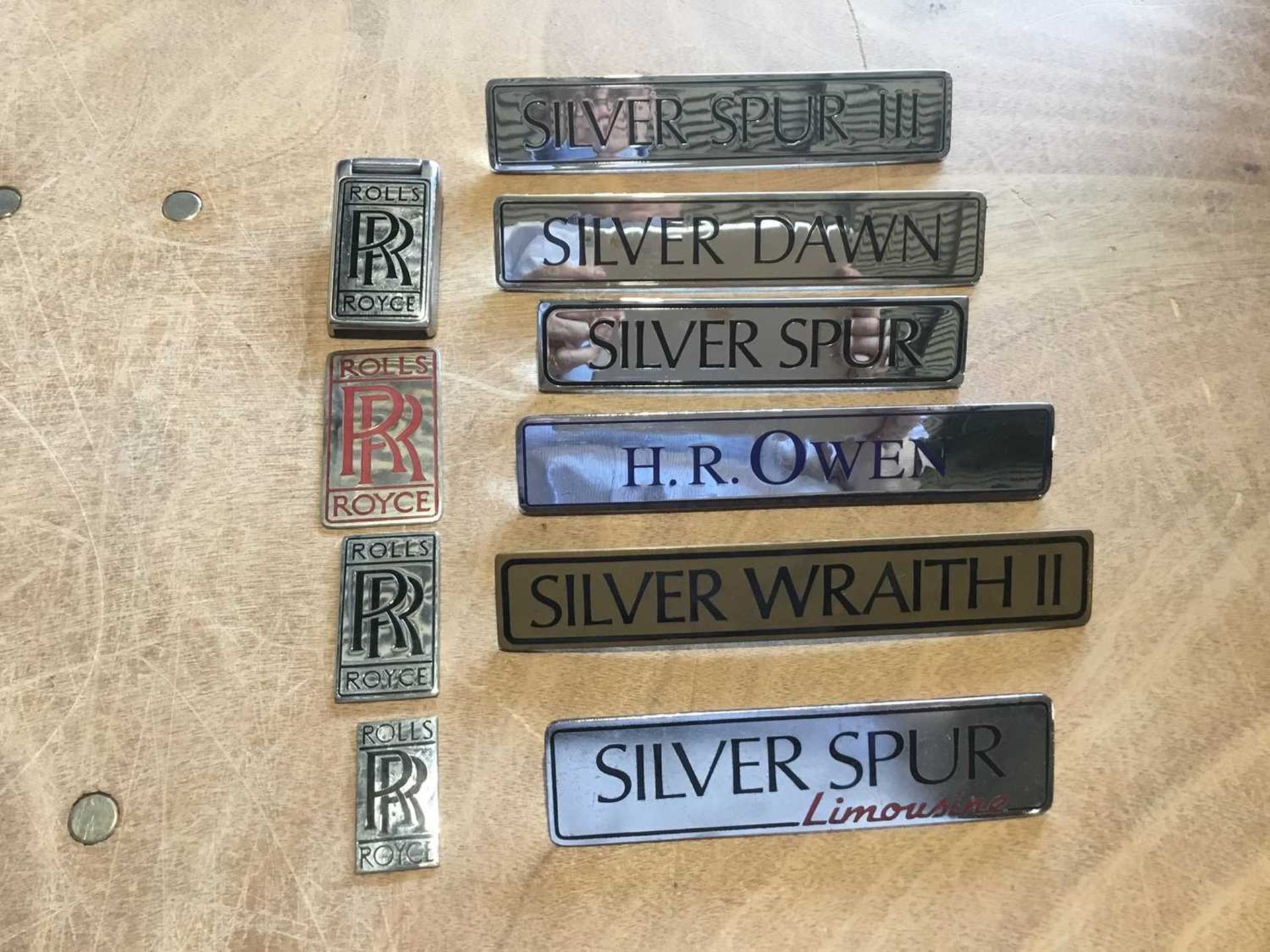 Collection of Rolls-Royce enamelled model name plates and boot badges (10)