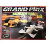 Two 1980's slot car sets together with a scalextric set (3)