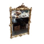 19th century gilt wood and gesso wall mirror, frame measures 97.5cm x 67.5cm in total