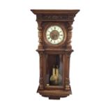 Late 19th Century Vienna Regulator wall clock in carved walnut case (pendulum and two weights presen