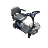 Kymco Mini S ForU mobility scooter (no charger) includes keys together with a Aidapt Wheelchair