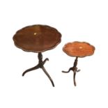 Two mahogany wine tables together with another
