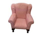 Child's wing back armchair on cabriole front legs