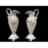 Pair of 19th century French white ewers mounted with swans