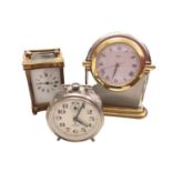 Swiza '1904' stainelss steel and brass mantle clock with rotating dial, brass cased mantle clock and