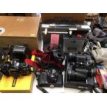 Group of vintage cameras, filming equipment and accessories