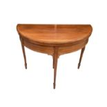 Edwardian inlaid mahogany card table with fold over top on square taper legs, 90cm wide