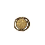 Edwardian gold full sovereign, 1914, in a 9ct gold brooch mount
