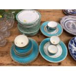 Assorted turquoise glazed plates and saucers, two cake stands and a selection of French plates with